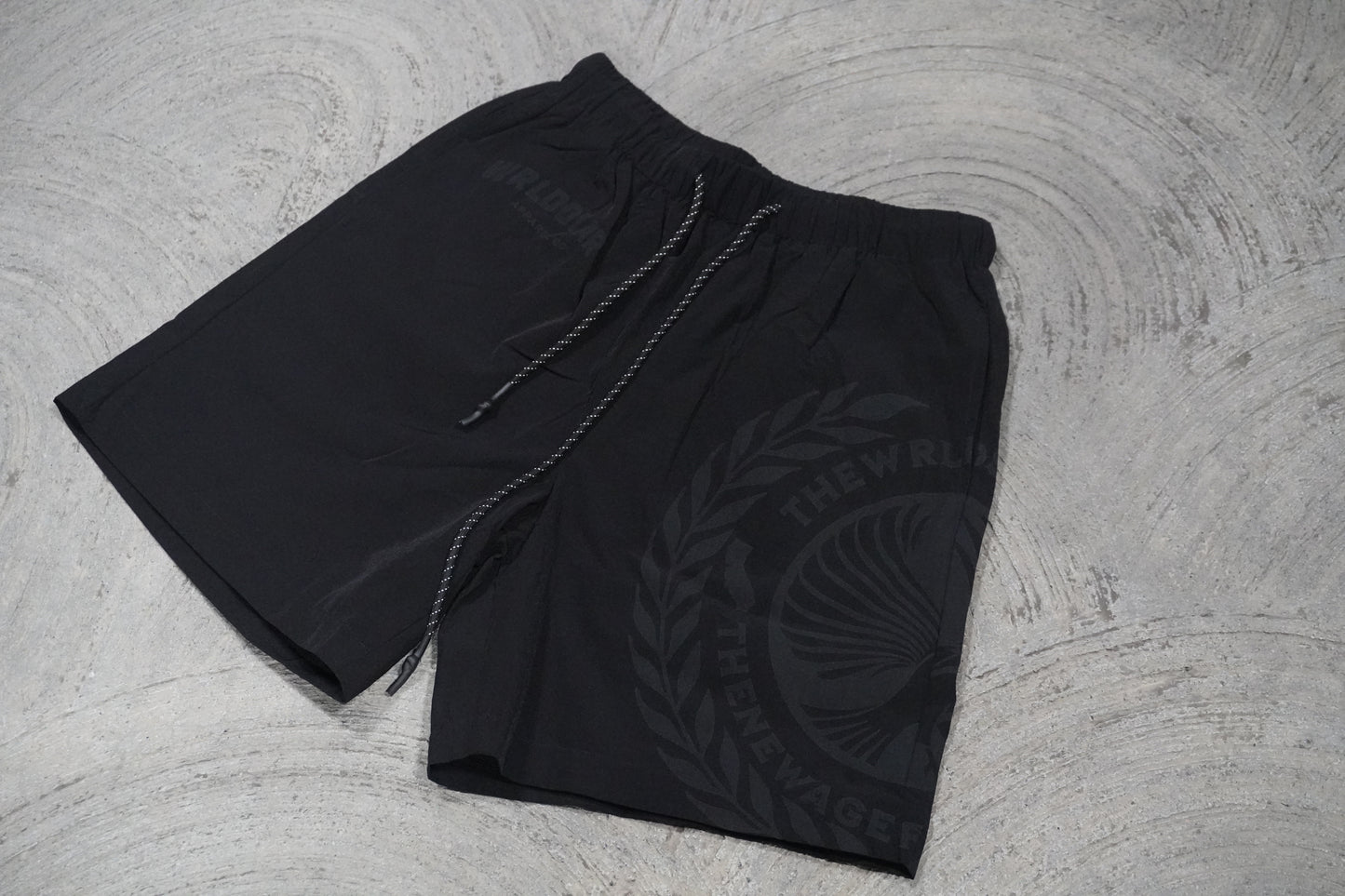 THE WORLDS NYLON SHORTS