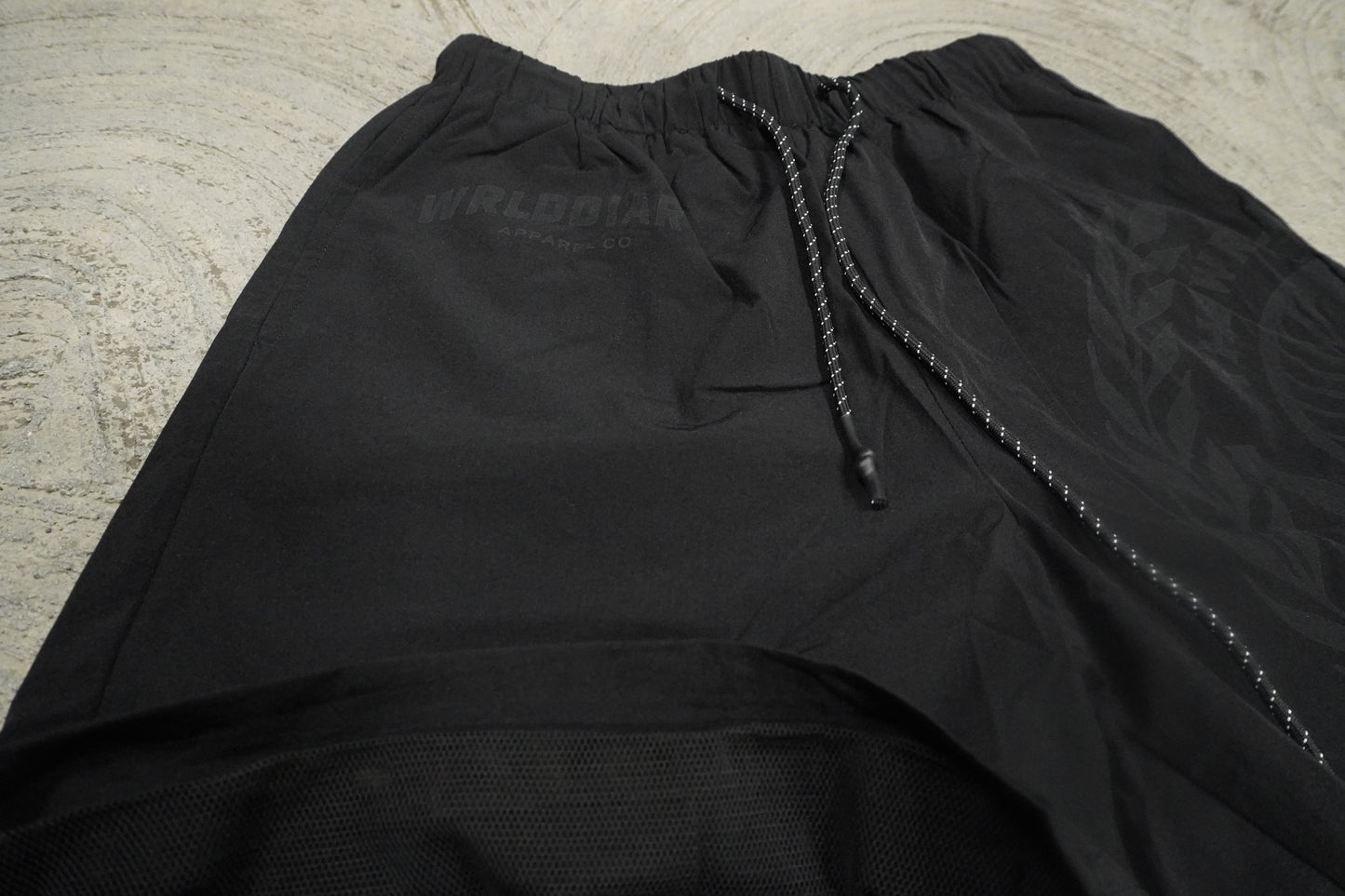THE WORLDS NYLON SHORTS